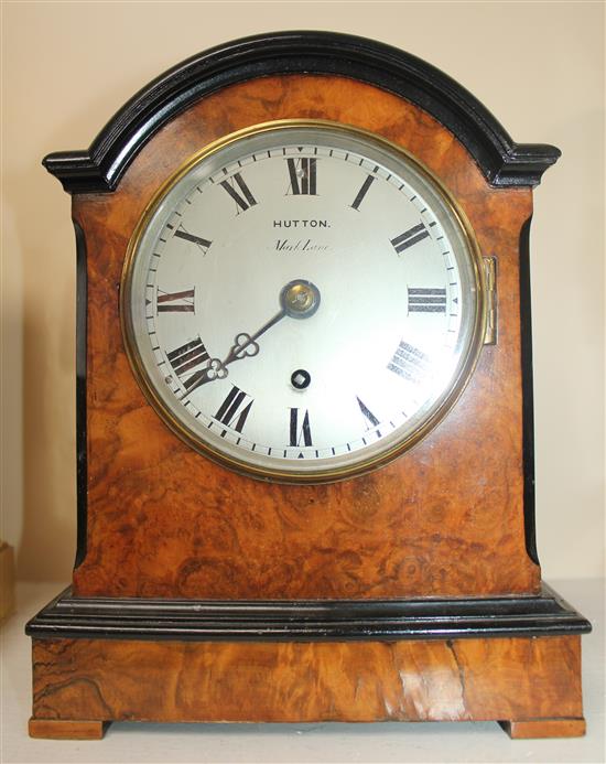 A Victorian ebonised and burr walnut single fusee mantel timepiece, 10.5in.